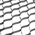 Black geocell ground grid with circular dot pattern, interlocking cells for gravel stabilization