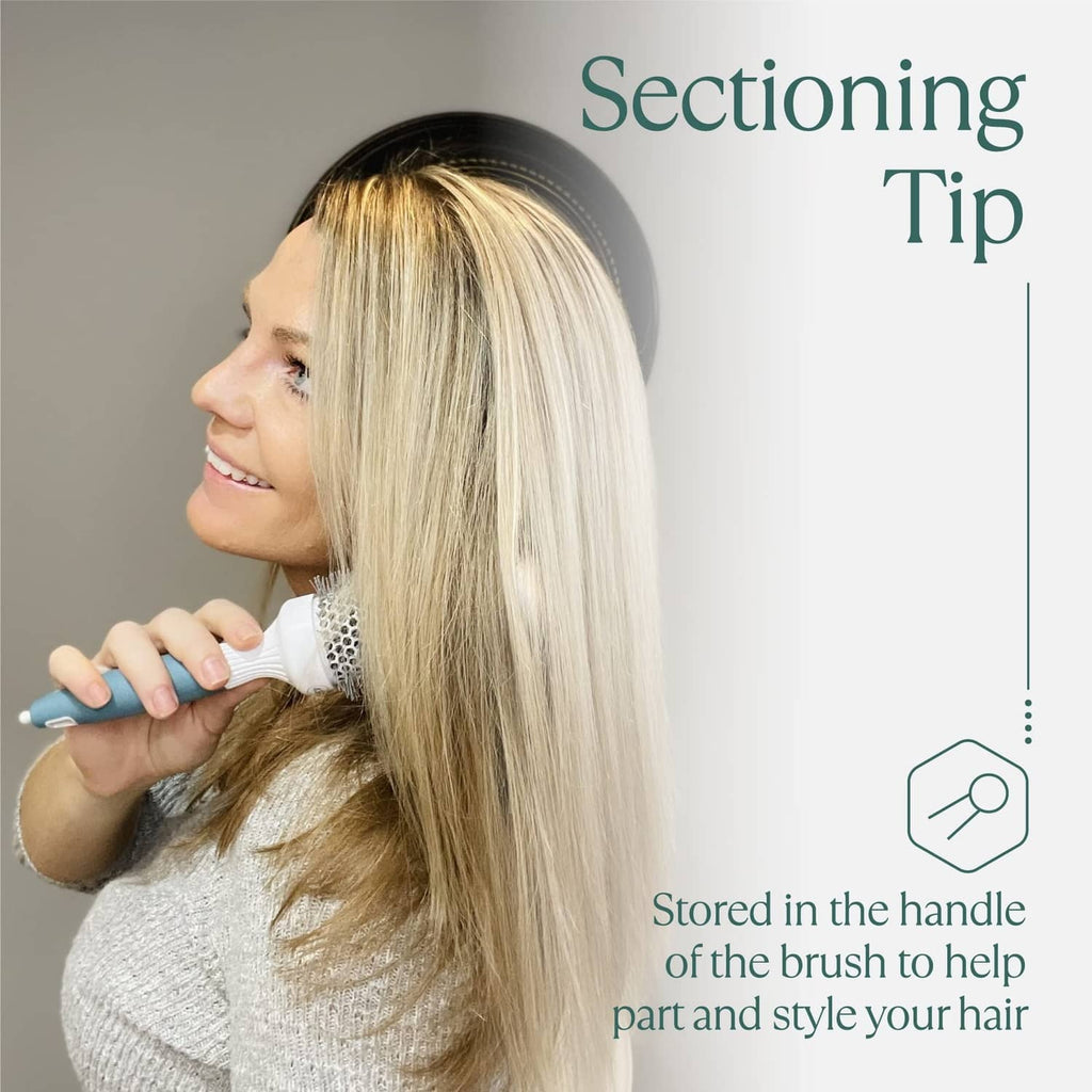 Round blow-dry brush for sectioning, teal handle with silver bristles and perforated barrel