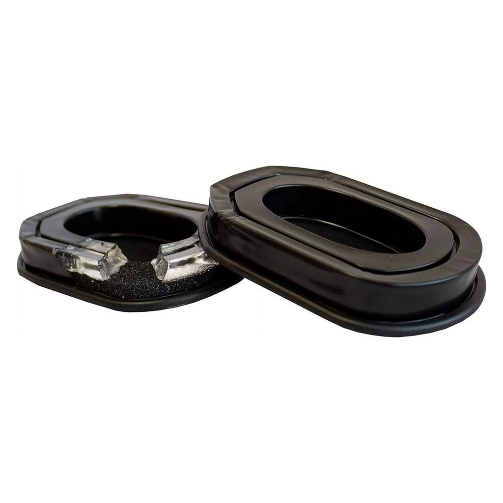 Two black gel-filled ear pads, one showing exposed metal mounting clips