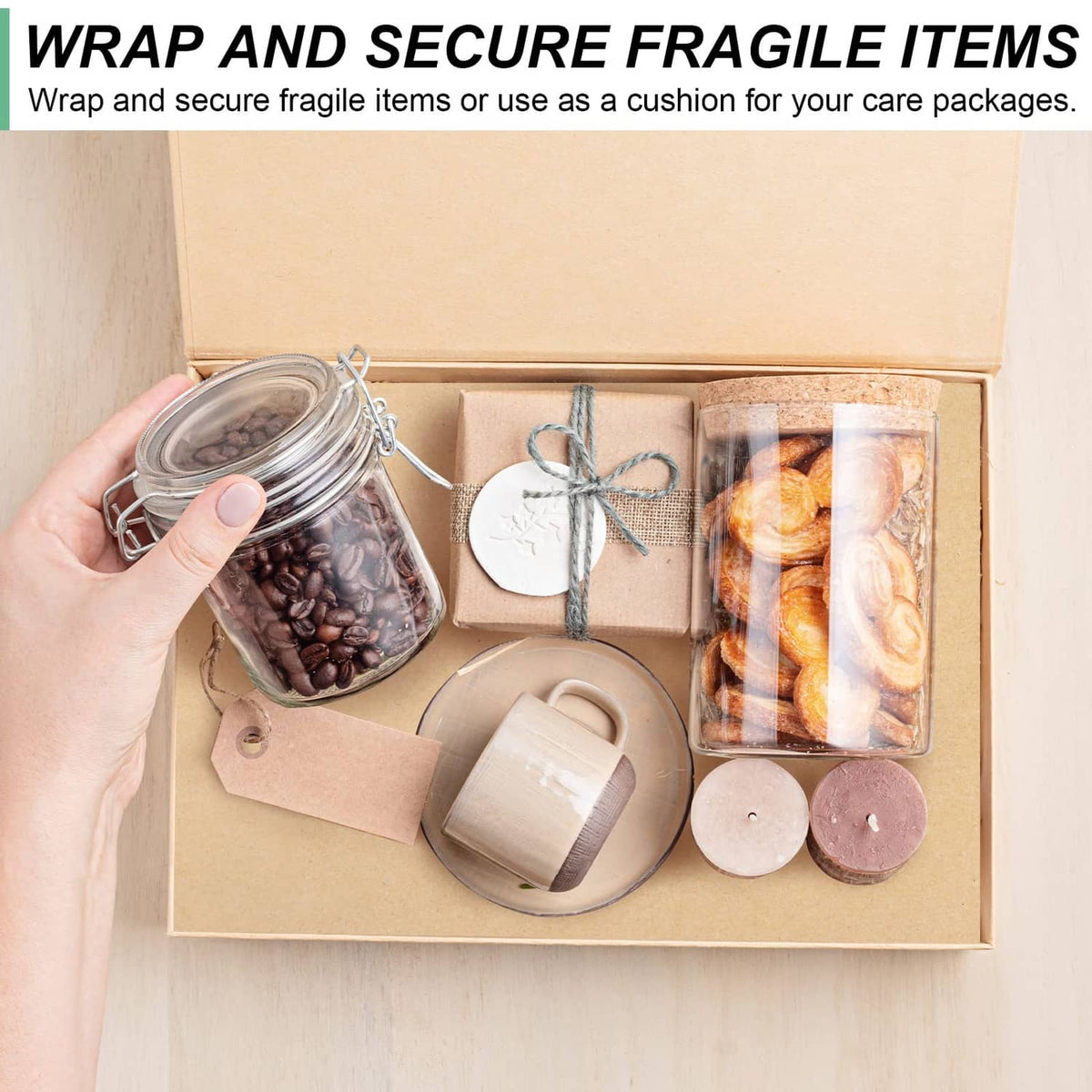 Brown kraft wrapping paper used to line gift box with fragile items