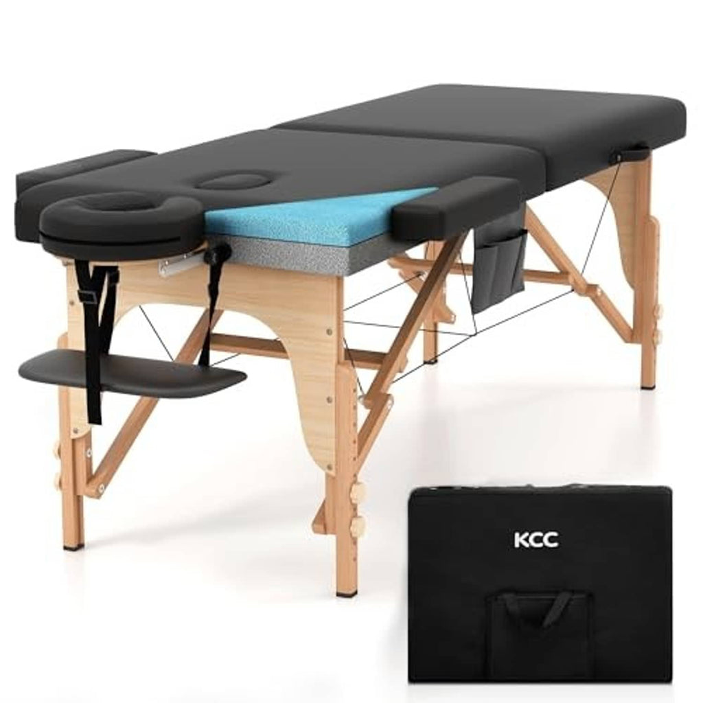 Portable massage table with black padding, blue memory foam, wooden legs and storage bag