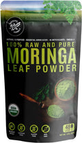 Moringa leaf powder pouch, black bag with green plant graphics and powder scoop icon