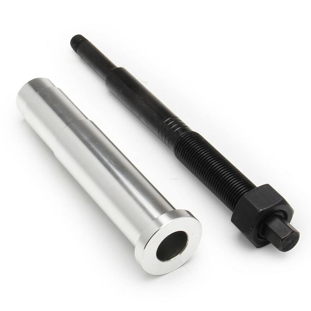 Broken spark plug remover kit with silver socket sleeve and black threaded pull rod
