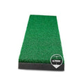 Green golf hitting strip with black base, labeled 47mm thickness