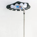 Black golf putter display rack with club heads and several golf balls in holders.
