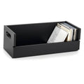 Black wooden CD storage tray with side handle cutout, holding stacked cases