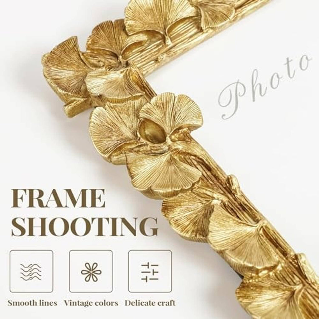 Close-up of ornate gold ginkgo leaf corner on a photo frame