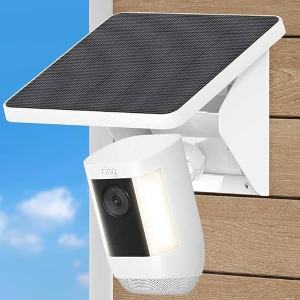 Wall-mounted solar charging mount with textured black panel and Ring camera, close view