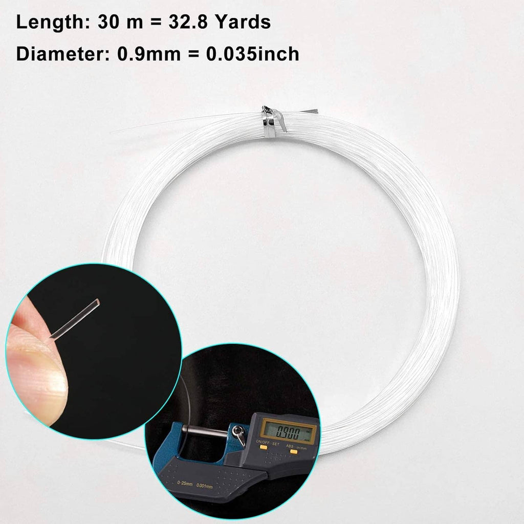 Coiled clear hanging wire with small metal clips for picture mounting