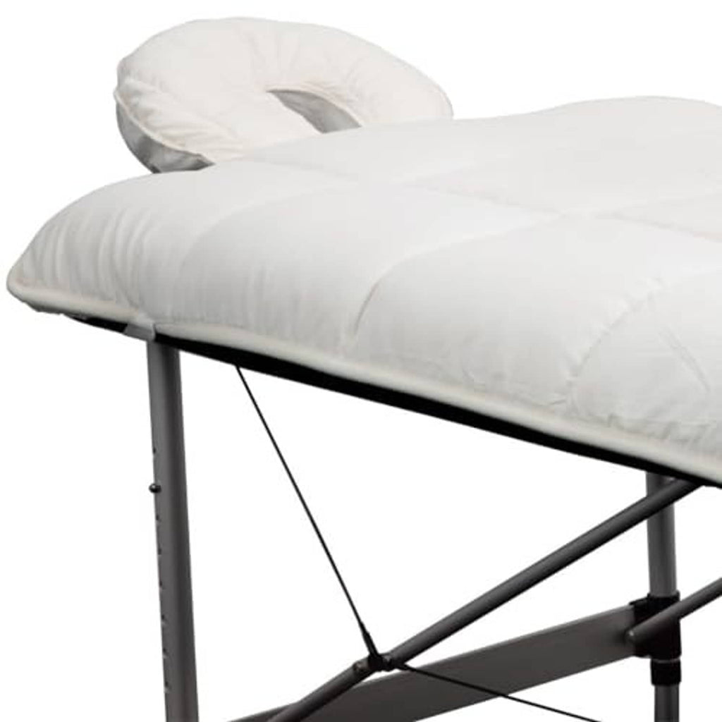 Natural quilted fleece massage table pad with smooth quilted surface and plush fill.