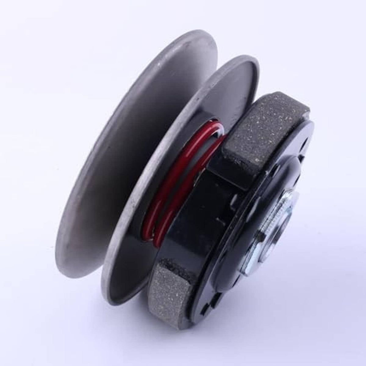 Clutch assembly side view, black housing with gray friction pads and red spring band
