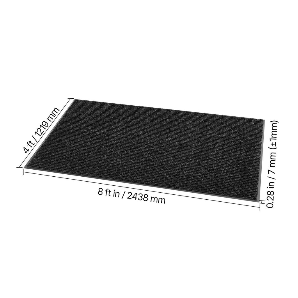 Rectangular black ribbed door mat shown flat with overall length and thickness markers.