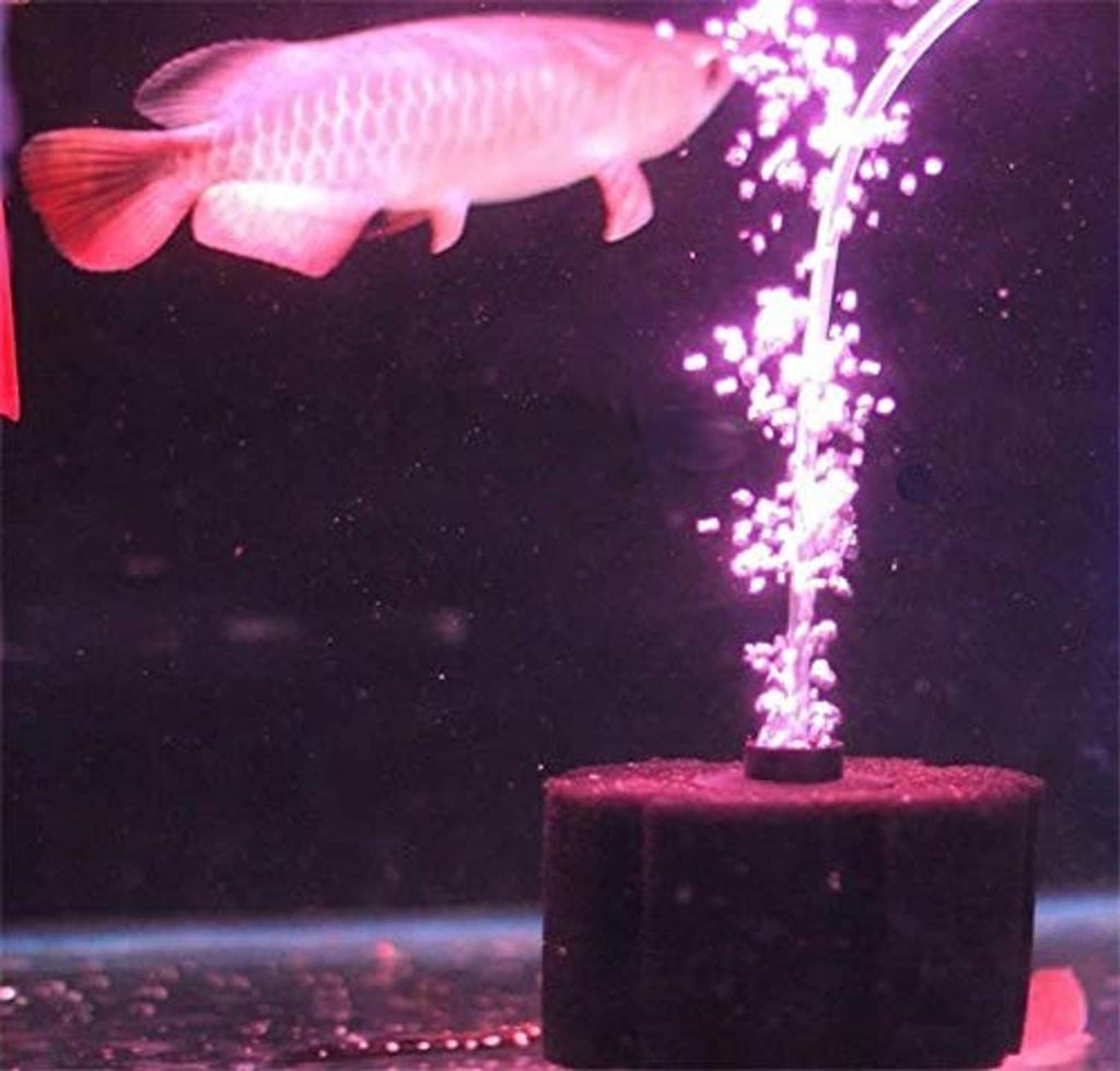 Black sponge filter with air stream rising from cartridge for aquarium filtration