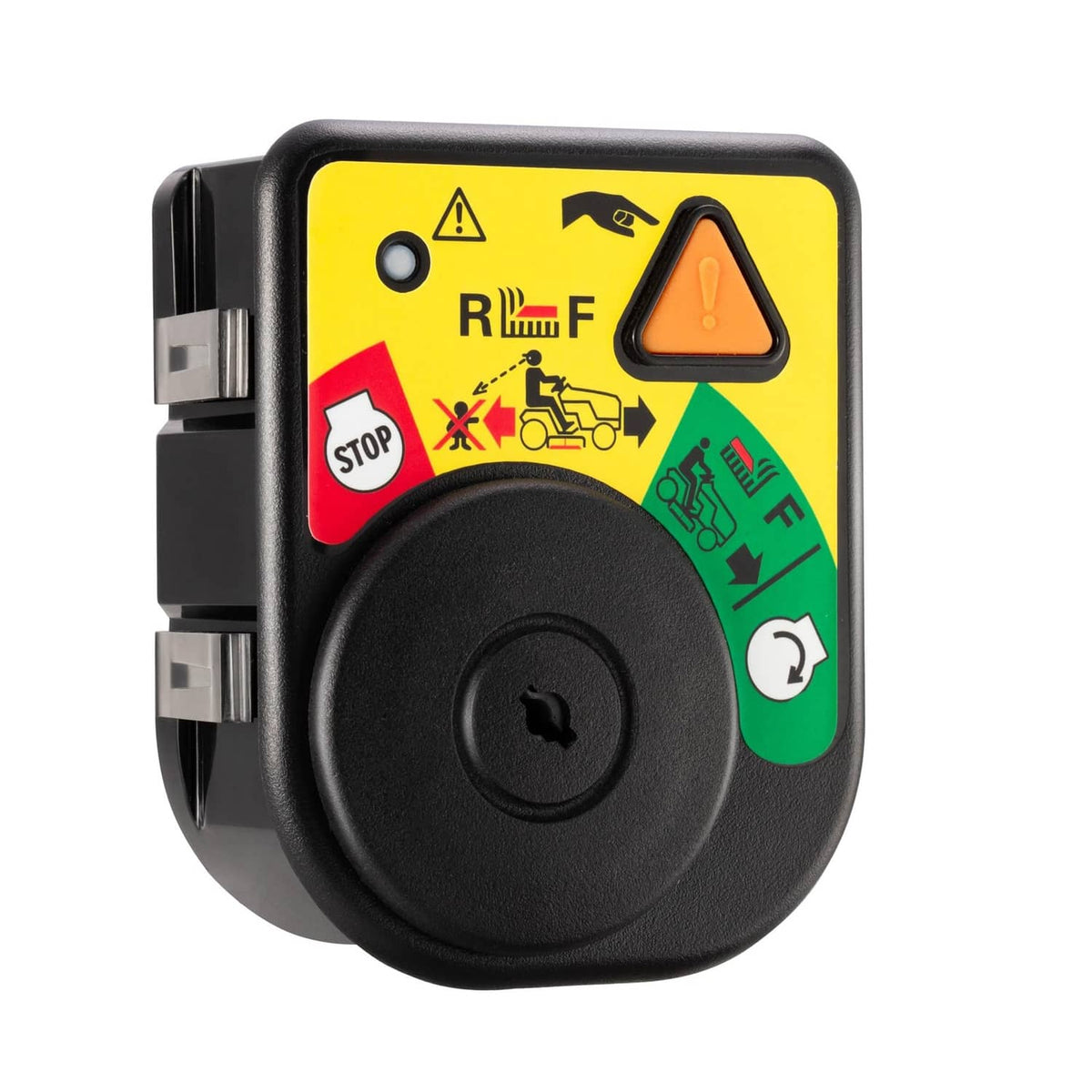 Ignition module switch close-up with black knob and multicolor warning decal panel