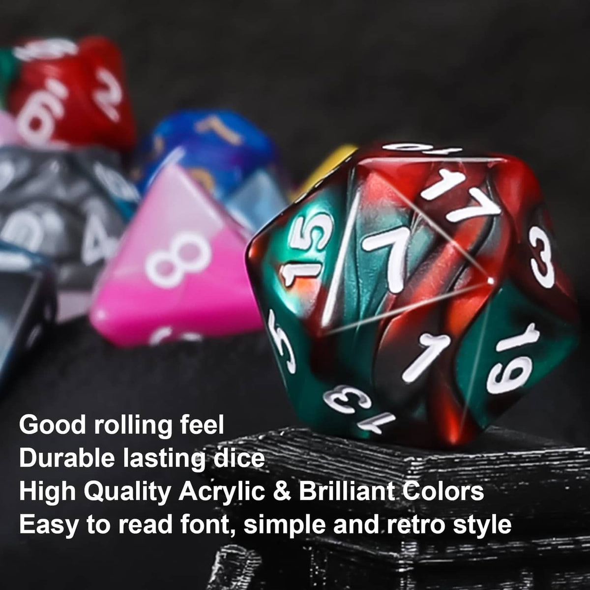 Close-up of glossy polyhedral dice with bold white numbers in teal, red, pink, and black