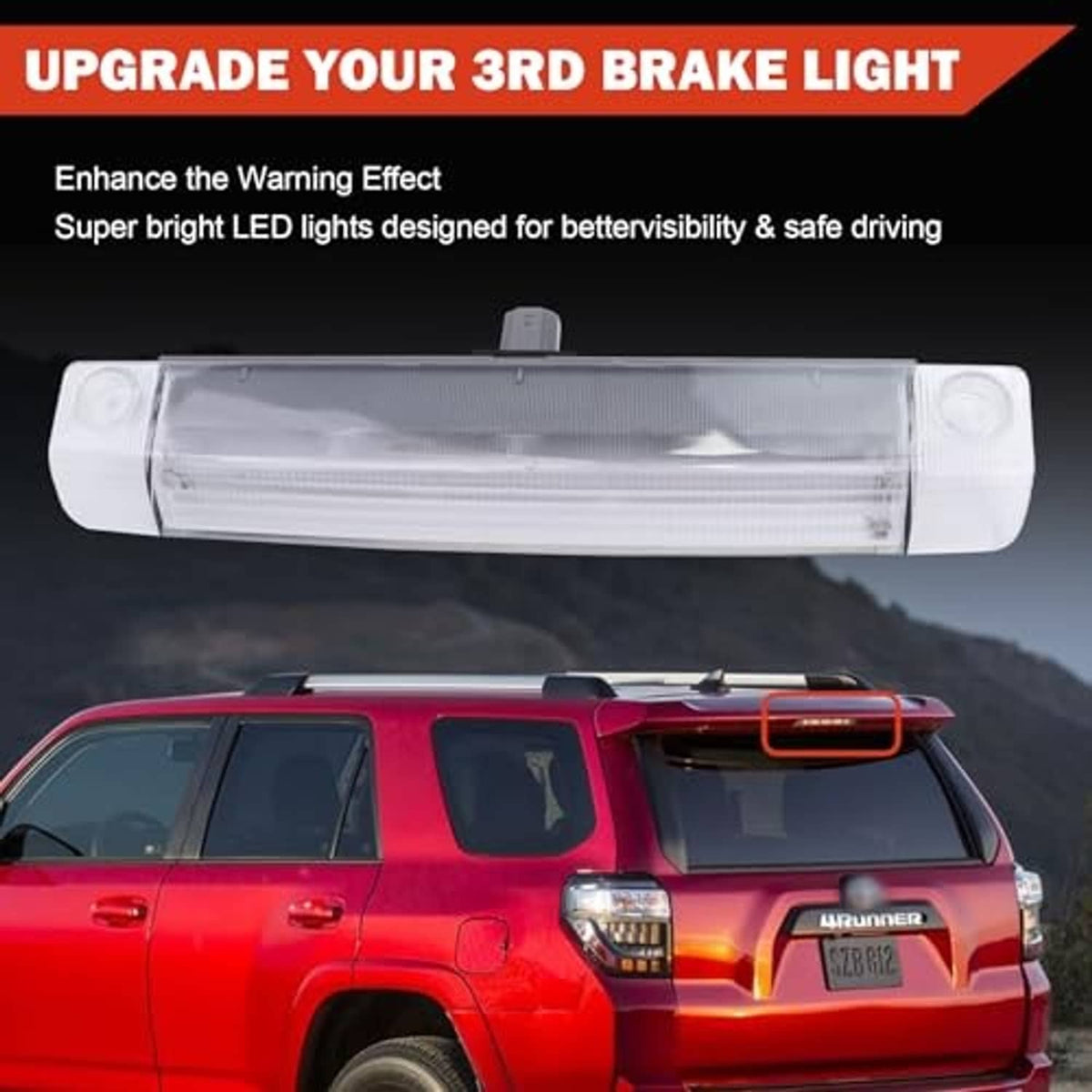 Third brake light bar with clear lens mounted on rear hatch of SUV
