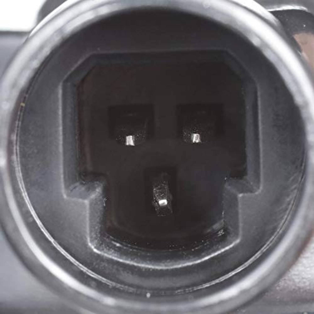 Throttle position sensor electrical connector face with metal rim and dark contacts
