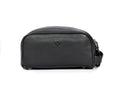 Black leather toiletry travel pouch with top zipper and side carry strap