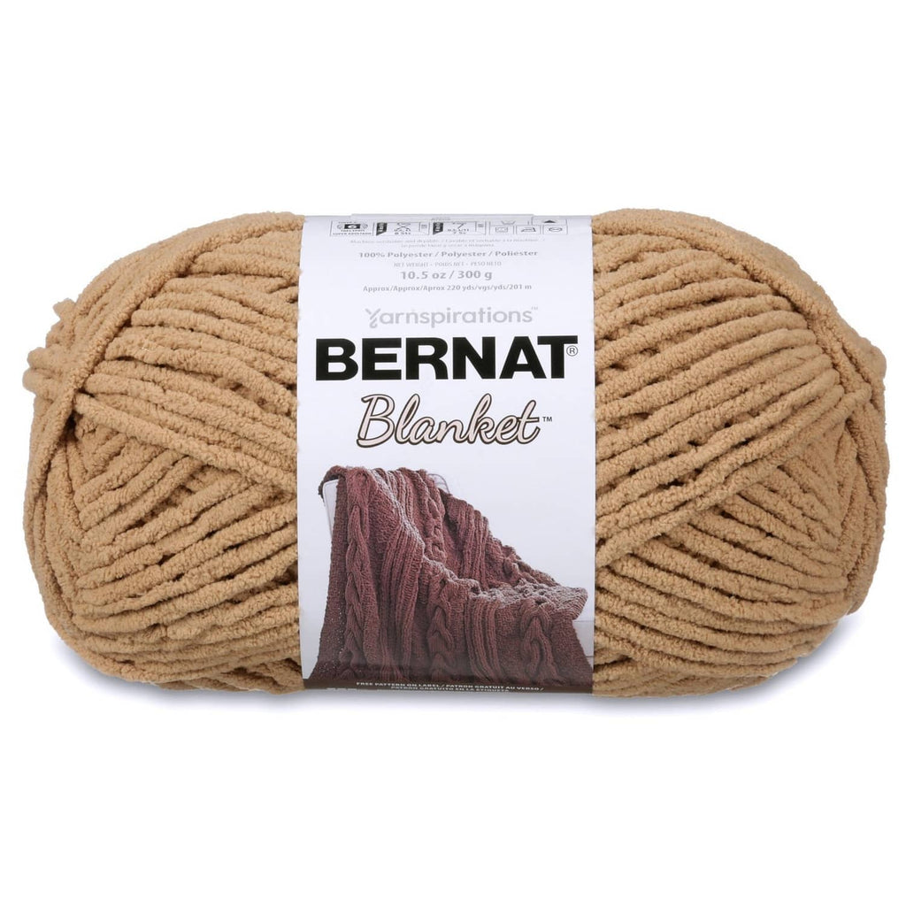 Tan Bernat Blanket super bulky yarn ball with label on thick chenille texture