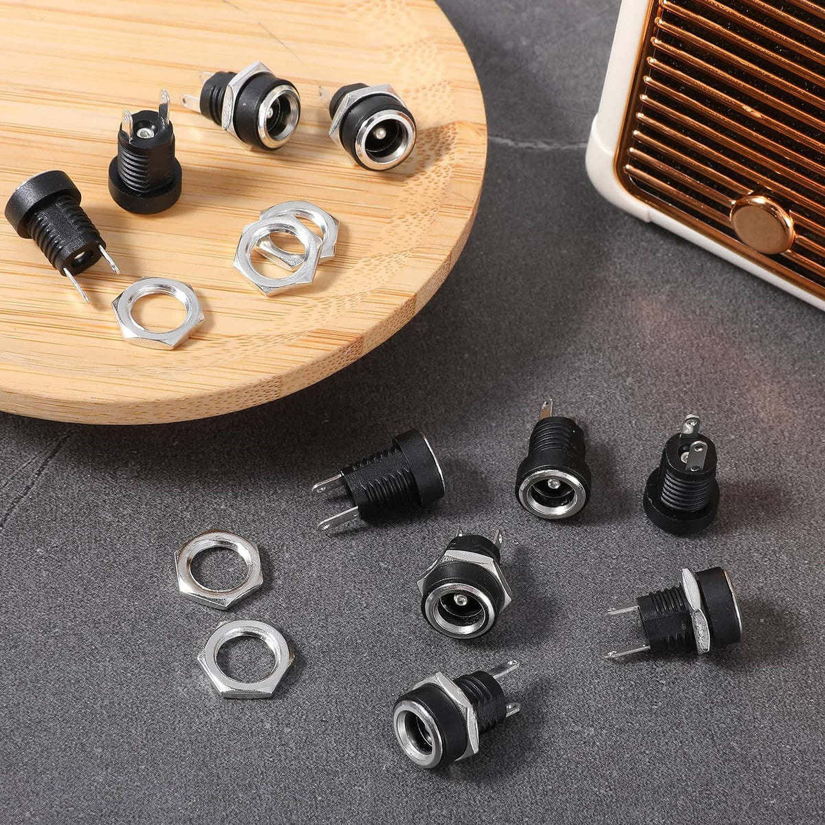 Set of black 5.5x2.1mm DC panel-mount power jack connectors with metal mounting nuts