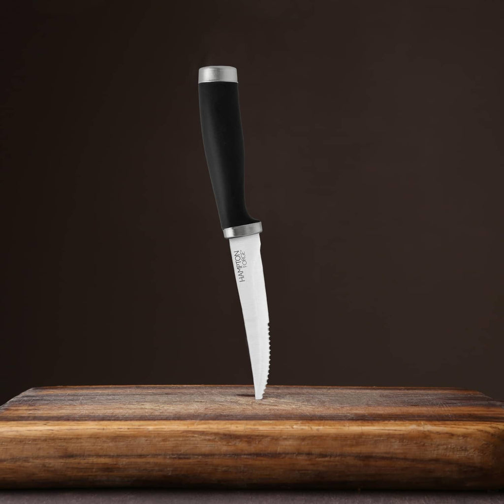 Hampton Forge steak knife with black handle and silver serrated blade
