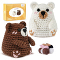 Crochet kit with brown and white bear plush toys, including yarn and accessories