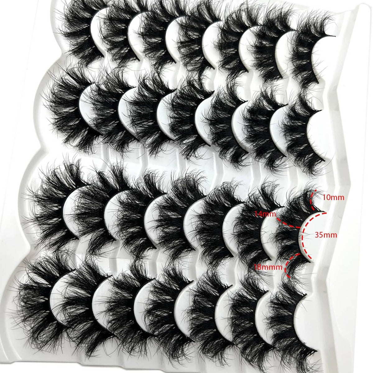 Black faux mink false eyelashes, long curled wispy lash strip set on tray
