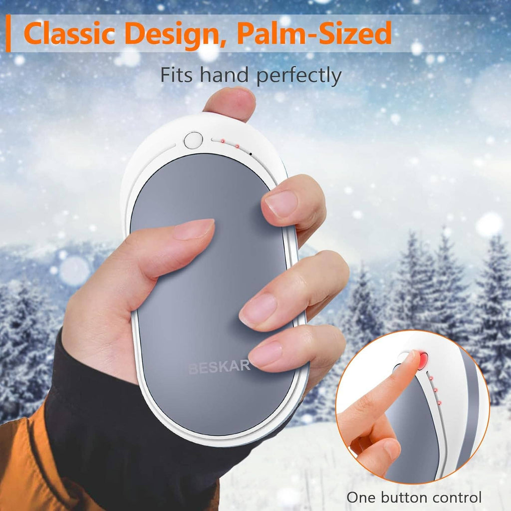 Palm-sized hand warmer in dark gray with white frame and one-button control for easy use