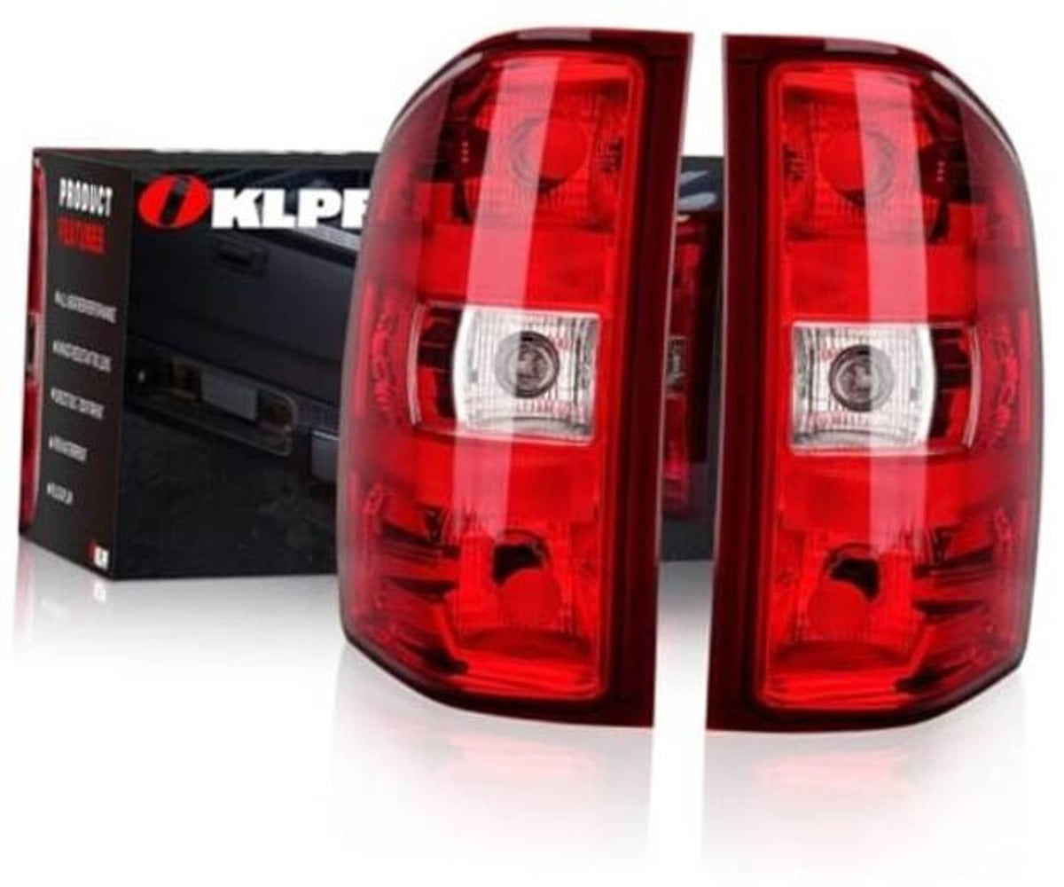 Pair of red rear tail lights with clear/chrome reflector inserts, driver and passenger