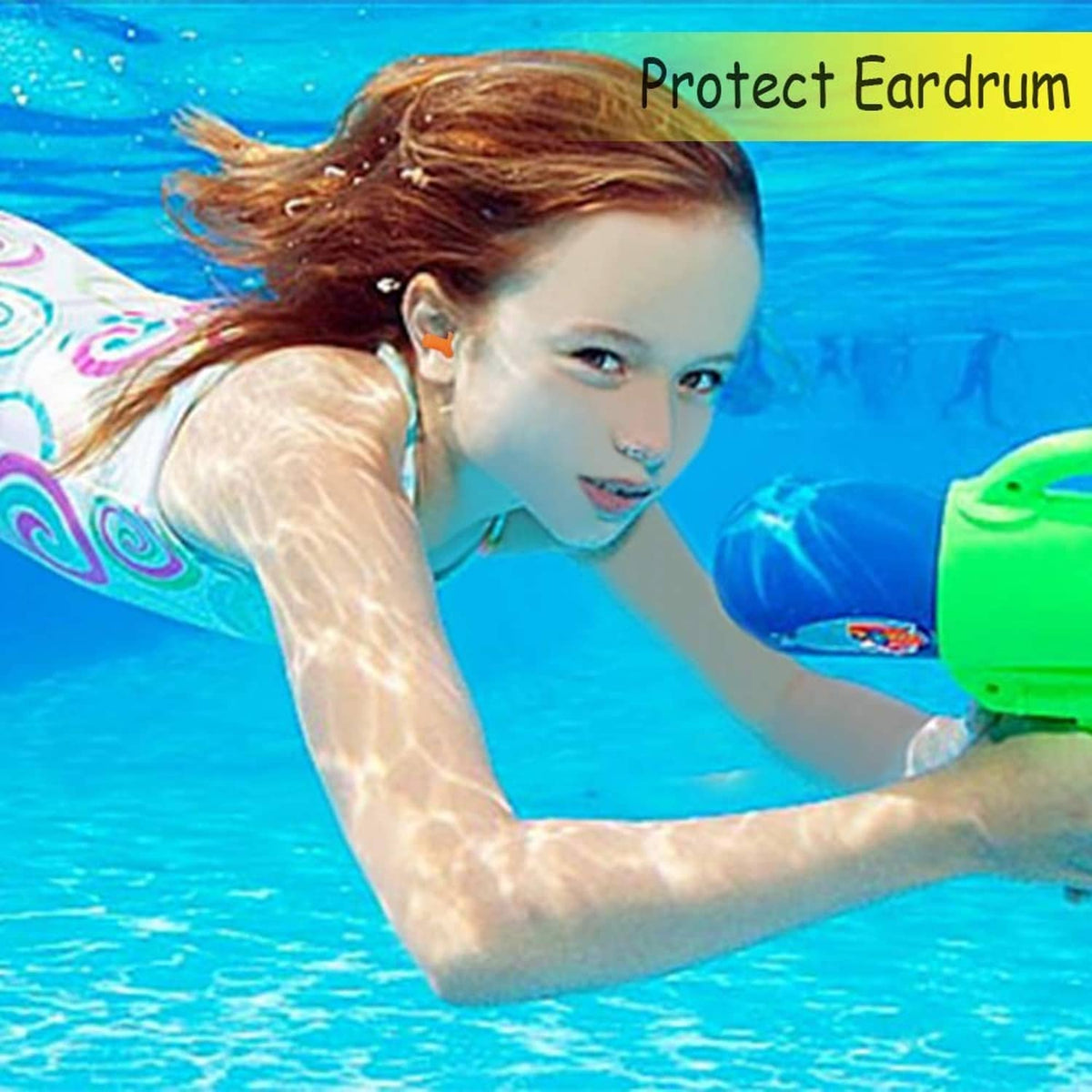 Green earplug in a child’s ear while swimming