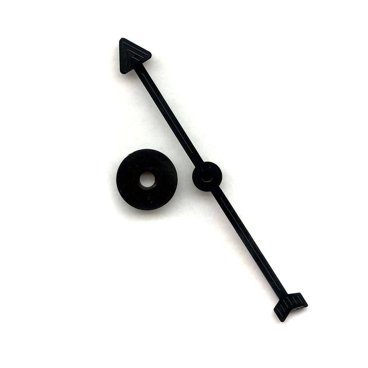 Black spinner board game piece with arrow pointer and round base