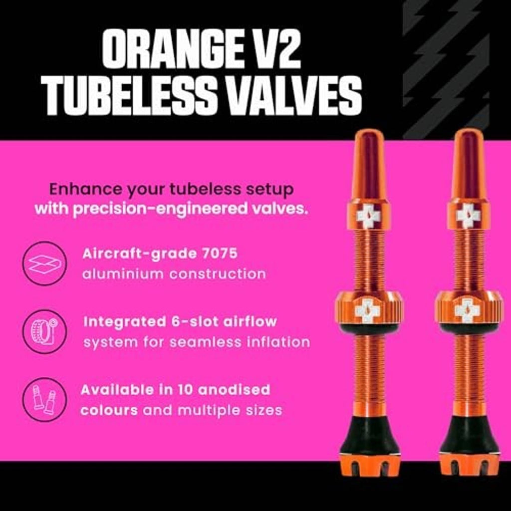 Pair of orange Presta tubeless valves with black bases and metal threaded stems