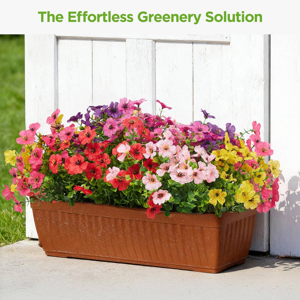 Artificial mixed-color flower arrangement in a brown rectangular planter