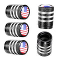 Set of black tire valve stem caps with laser-etched U.S. flag emblems and silver stripe bands.