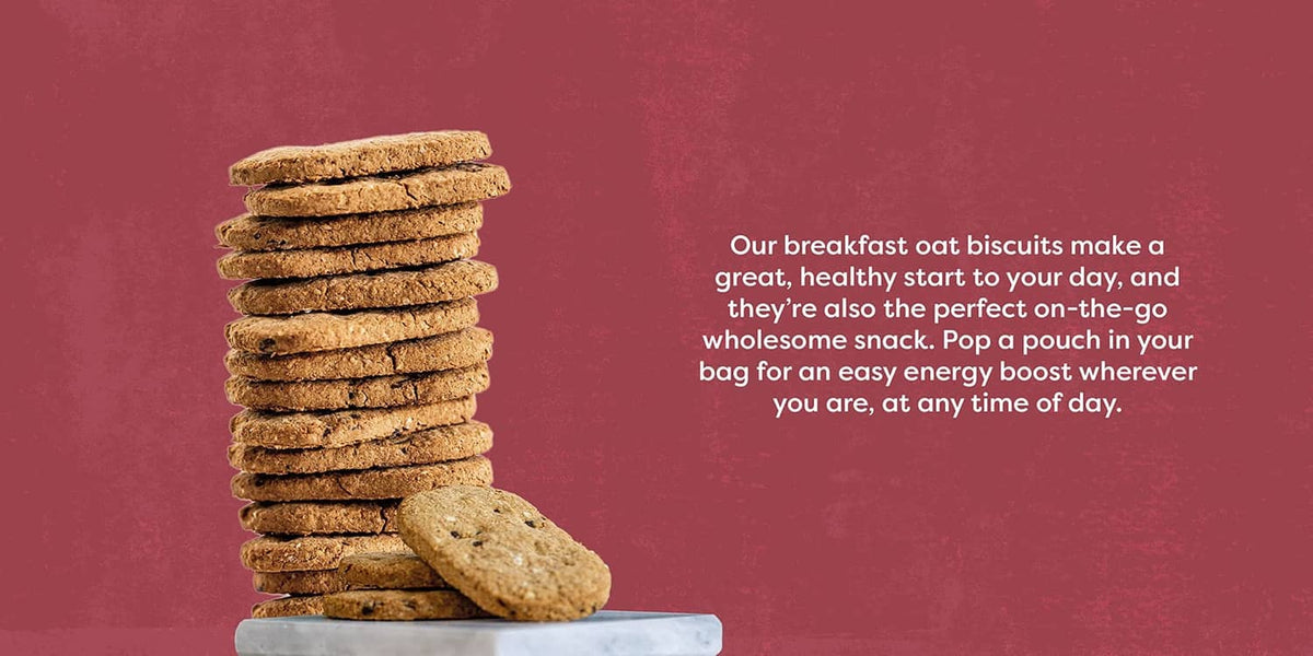 Stack of oat graham snack crackers next to Nairn's gluten-free oat grahams box