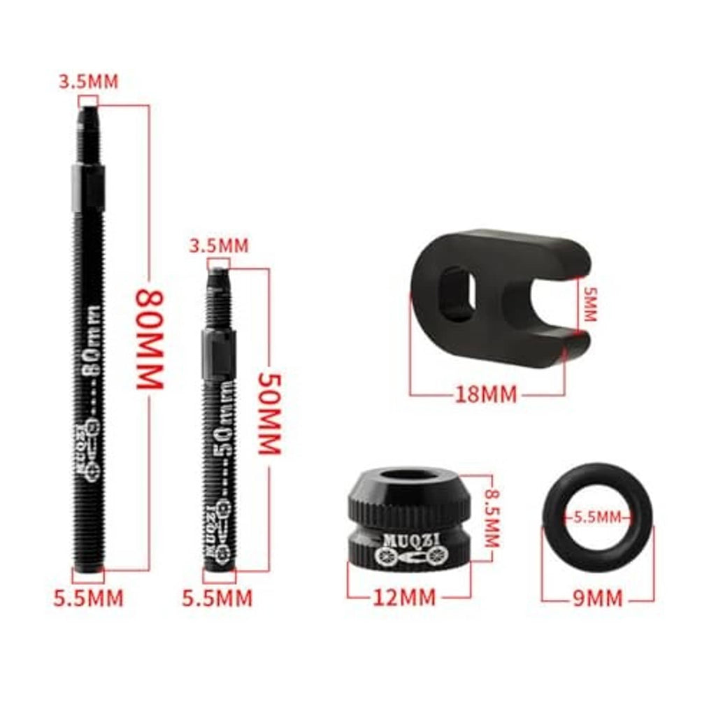 Black tubeless valve extension with adapter bracket and size guide markings