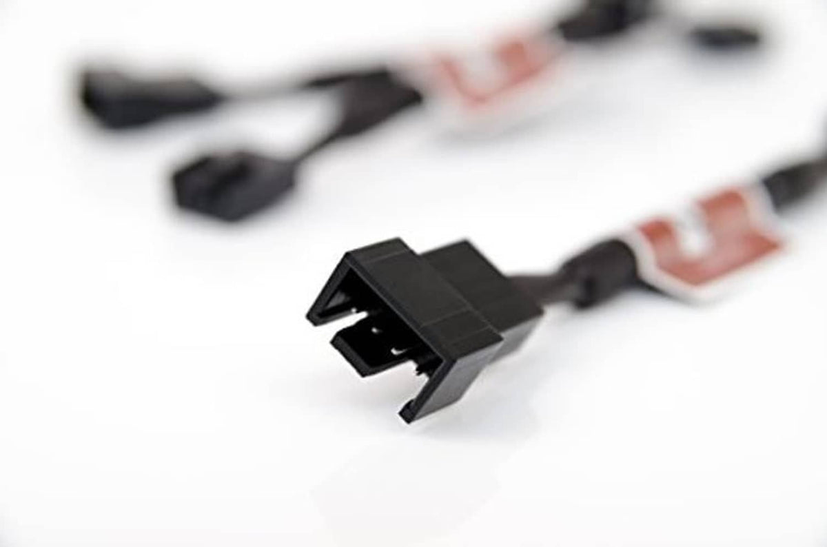 Black 4-pin connector ends for PC fan adaptor cable set, close-up
