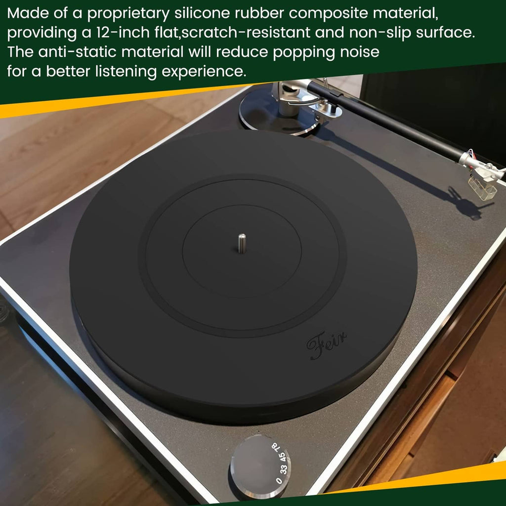 Black silicone platter mat on turntable deck, showing concentric ring pattern