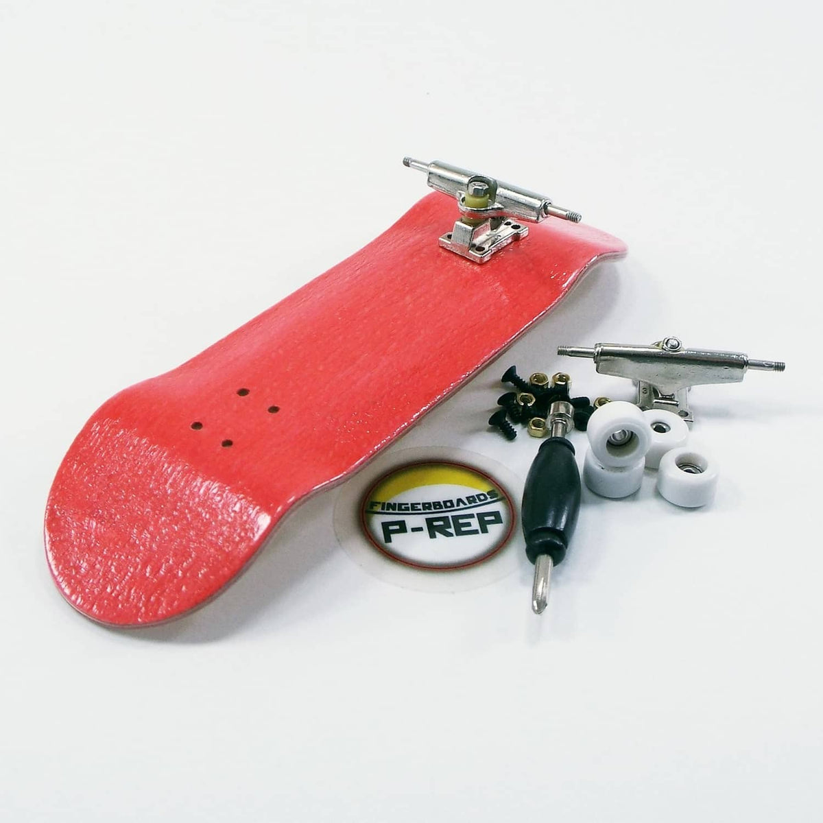 Red wooden fingerboard deck with metal trucks, wheels, and accessory parts