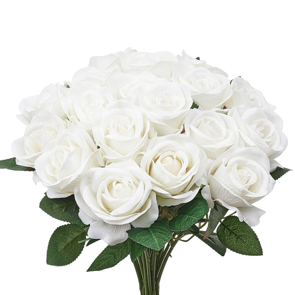 Full white artificial rose bouquet with green leaves, dense clustered blooms