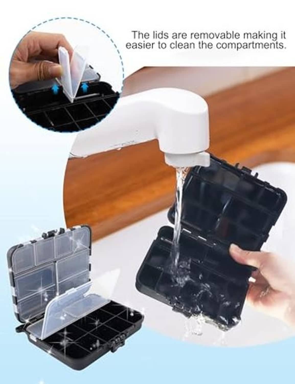 Black plastic tackle organizer box being rinsed, with clear-lid compartments.