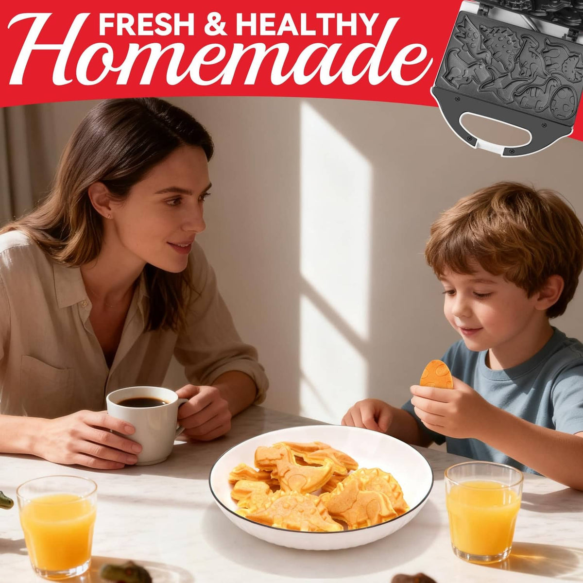 Compact dinosaur mini waffle maker in use with dinosaur waffles on a plate