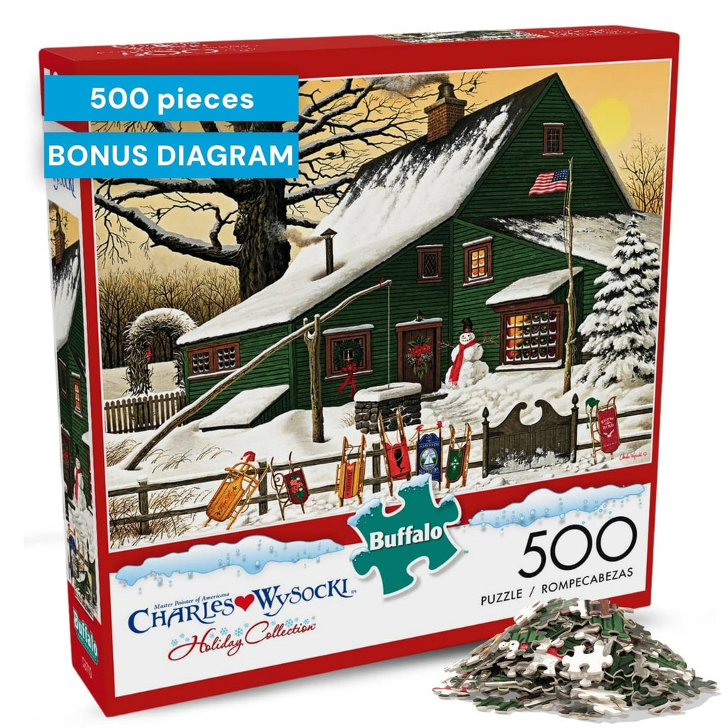 500-piece jigsaw puzzle box showing a snowy cabin scene with people and decorations
