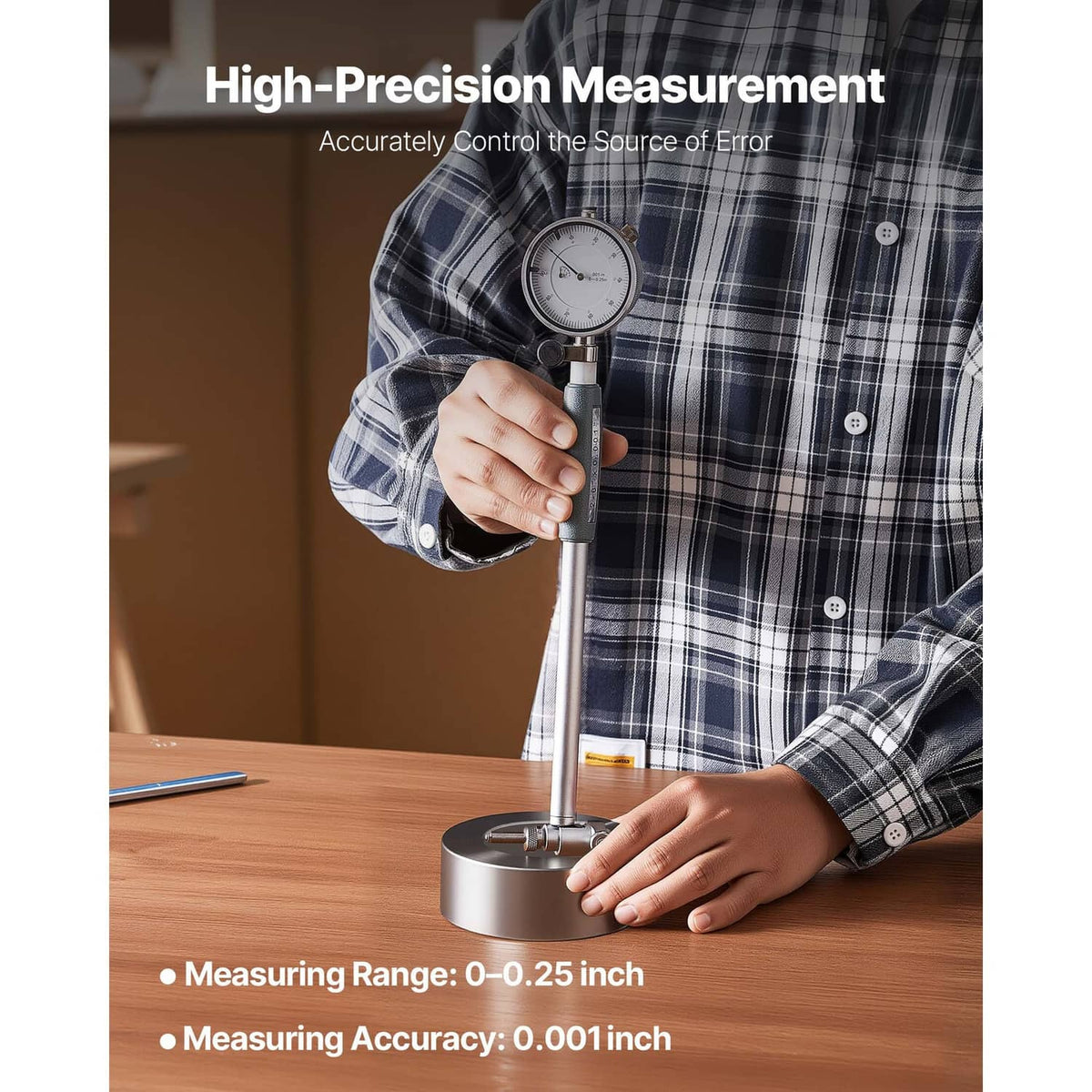 Dial test indicator bore gauge held in hand for precise bore measurement