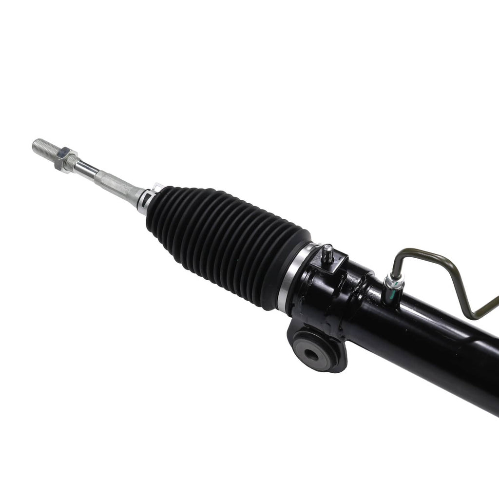Power steering rack and pinion assembly with black ribbed boot and silver rod