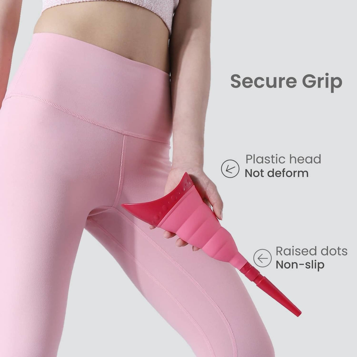 Pink foldable female urinal device with grip, raised non-slip dots, and extension tube