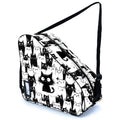 Black-and-white cat print skate bag with carry handle and shoulder strap