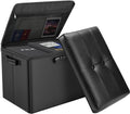 Black storage ottoman with open lid, padded top, lock latches and storage compartment.