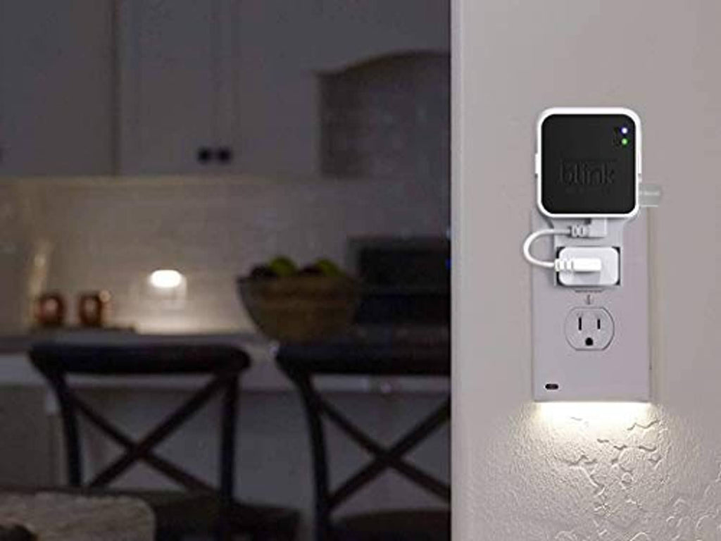 Blink Sync Module 2 outlet mount with USB thumb drive plugged into wall outlet