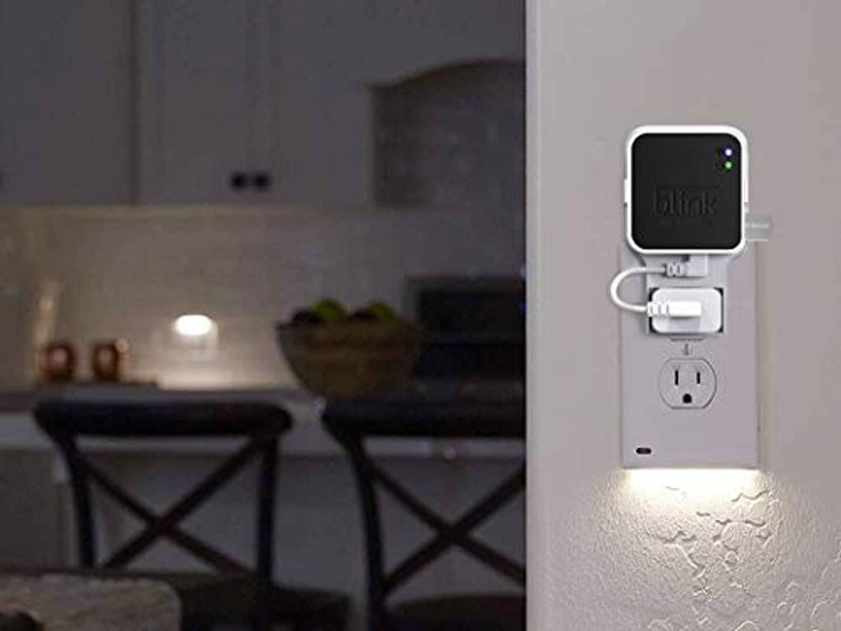 Blink Sync Module 2 outlet mount with USB thumb drive plugged into wall outlet